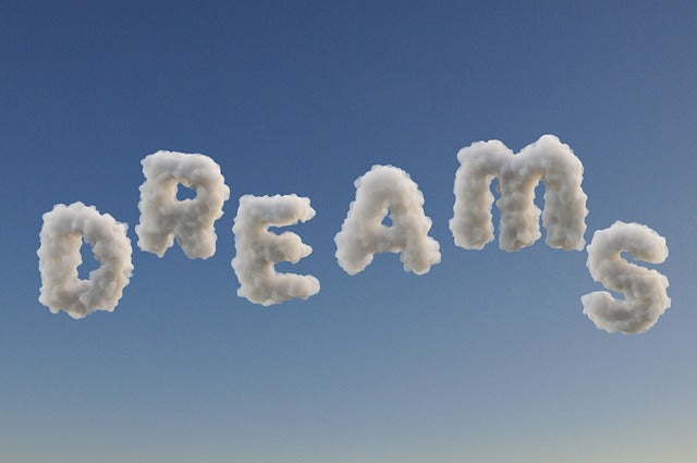 clouds spelling out dreams