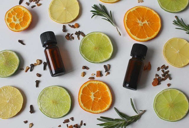 essential-oils-laid-with-citrus-fruit